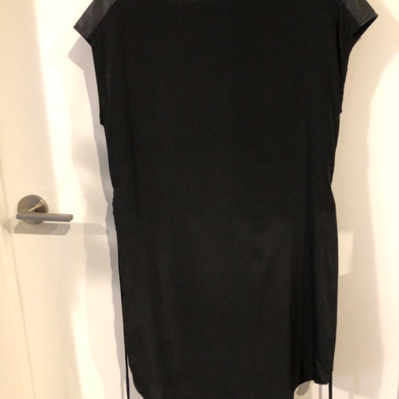 Black sleeveless dress with faux leather trim. - Picture 4 of 5